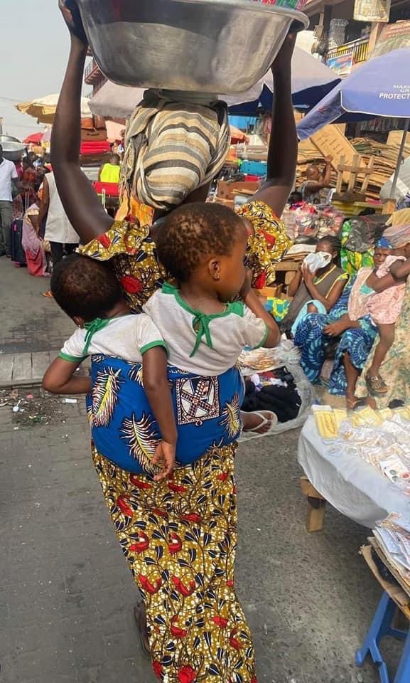 Woman who sells water with her twins strapped at her back finds favour as Keche Joshua pleads for people to find her for him